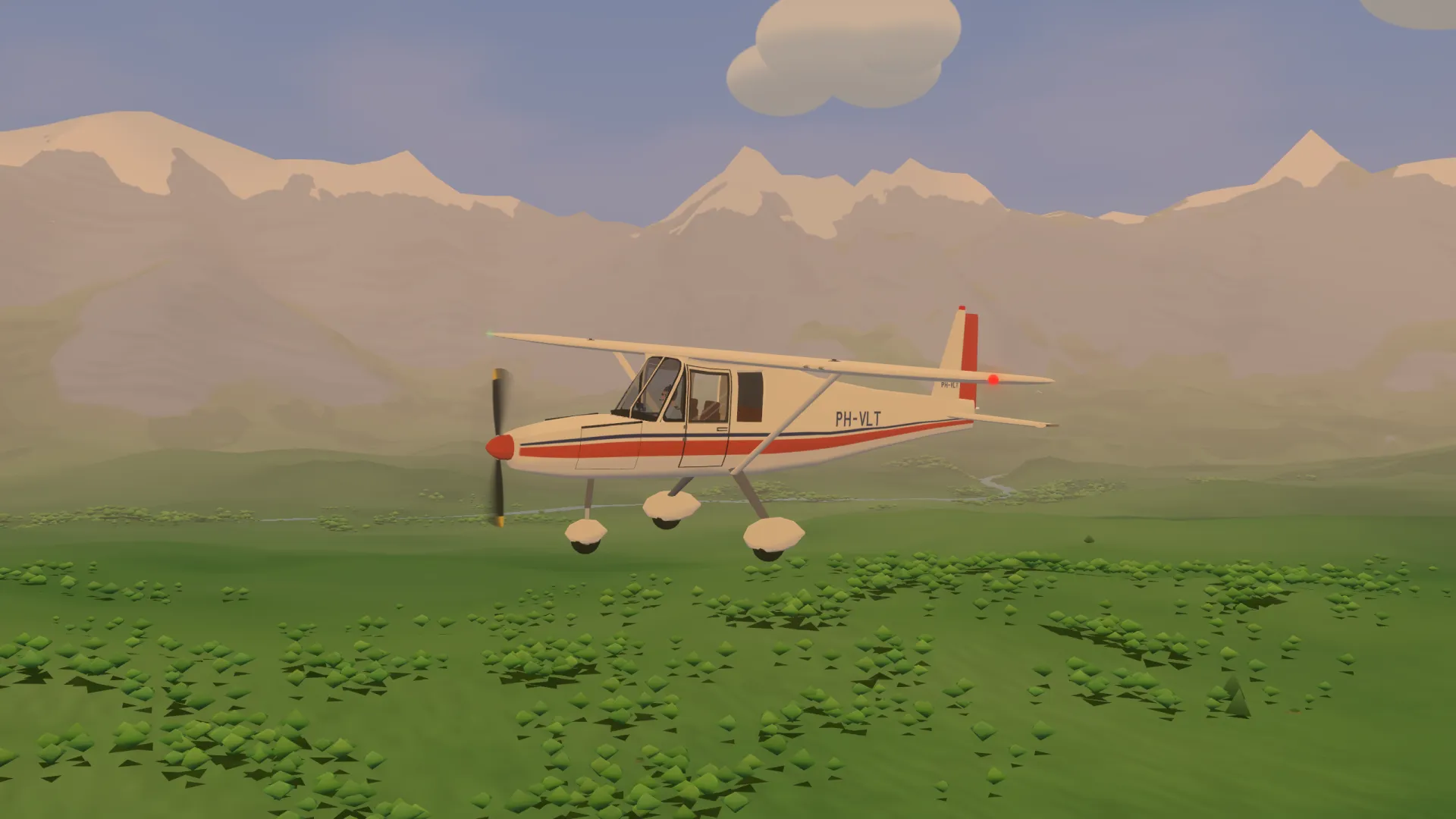 A small high wing plane flying low over the valley in evening light